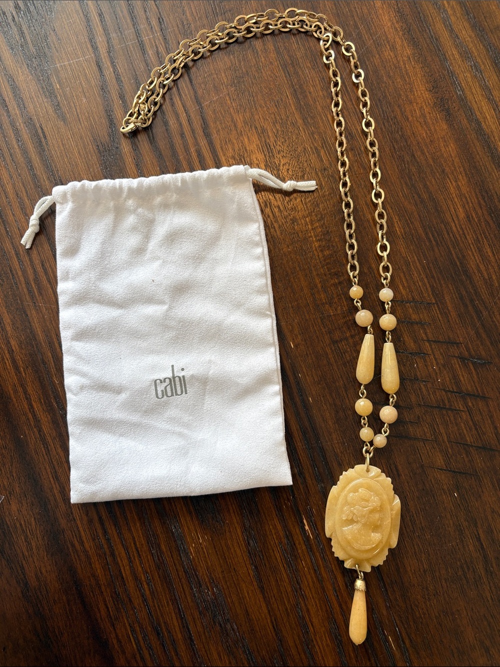 CAbi Gold-Tone Necklace with Cream Carved Pendant and Beads